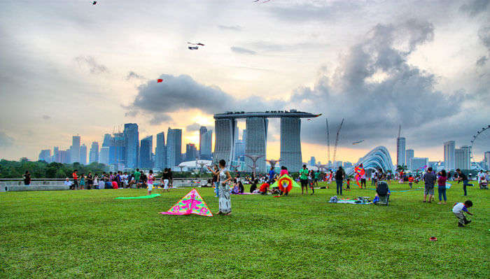 Among exciting things to do in Singapore for free is flying kites at Marina Barrage