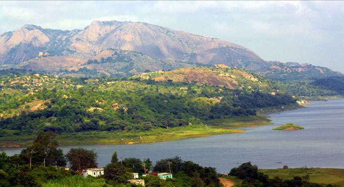 A majestic view of the Manchinbele Dam at the foothills of Savandurga