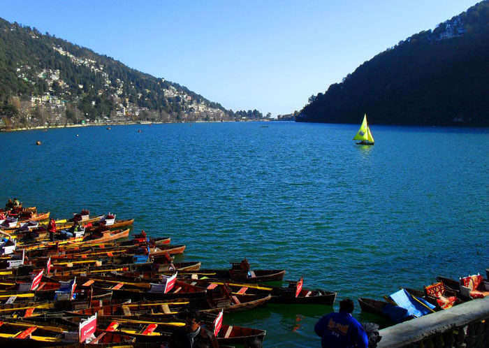Boats line up at the shore of Naini Lake at Nainital