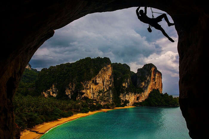 A man tries rock climbing at Tonsai Island