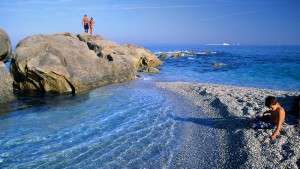 Tourists enjoy a summer day on the Costa Del Sol Beach