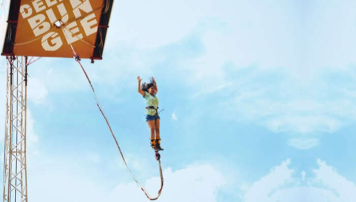 A girl trying bungee jumping in Pune - Mumbai precincts