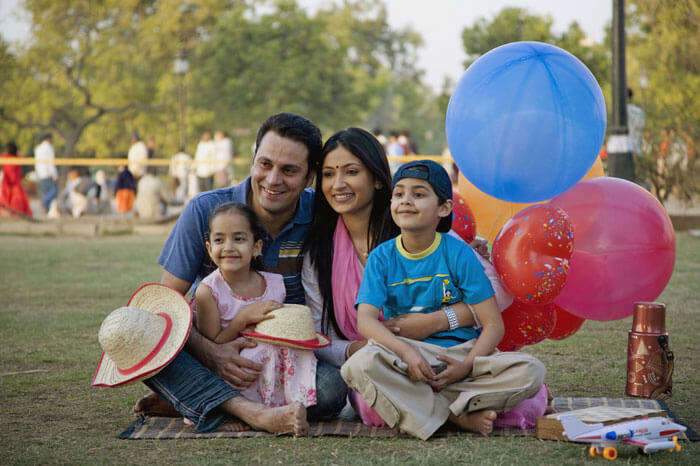 A family enjoys a holiday at a picnic spot near Kolkata