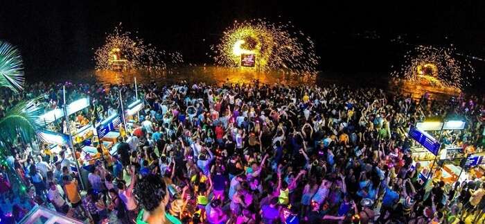 Crowd enjoying the music madness at Full Moon party in Thailand