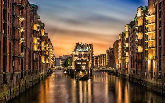 The illuminated canal city of Hamburg in Germany at night
