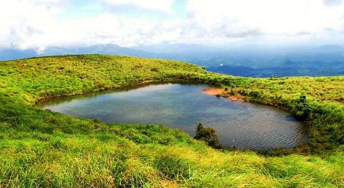 The heart-sjaped Chembra Lake in Western Ghats is one of the top unexplored places in India