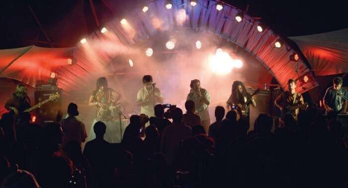 A band of seven performing at the Escape Festival