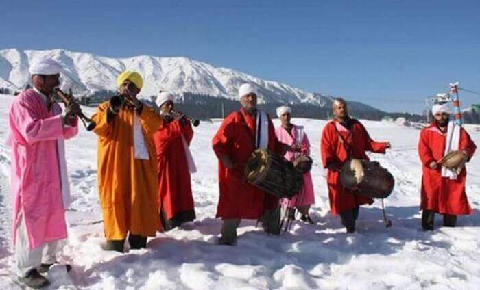 Artists performing popular folk tunes at Gulmarg Snow Festival