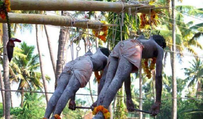 Hanging on hooks at Garudan Thookkam