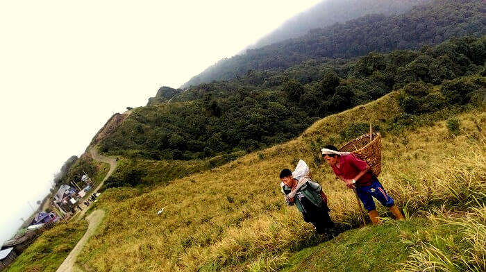 Farmers working in the mountains