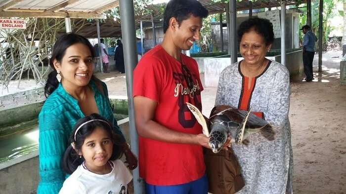 Roshan with his family in the turtle hatchery