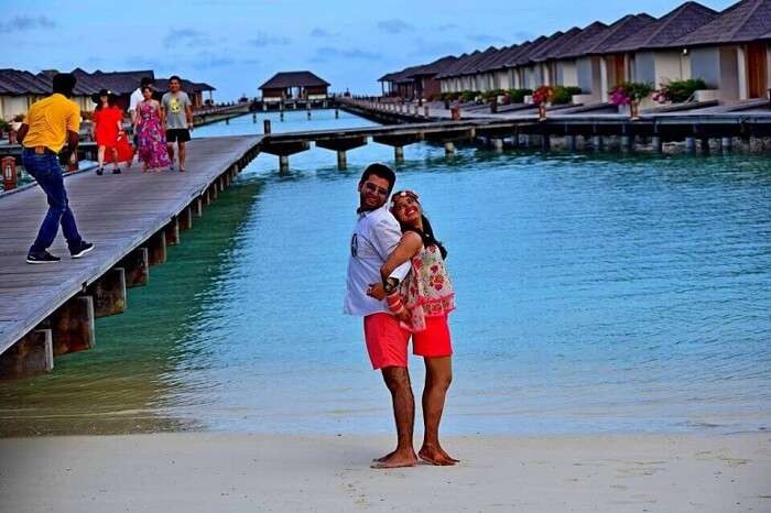 Yatin and his wife posing at the dock in Paradise Island Beach Resort