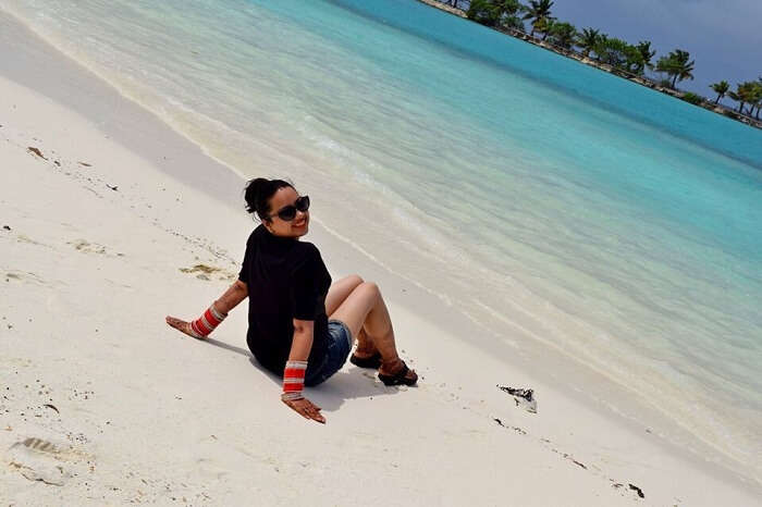 Yatins wife on the beach in Paradise Resort Maldives