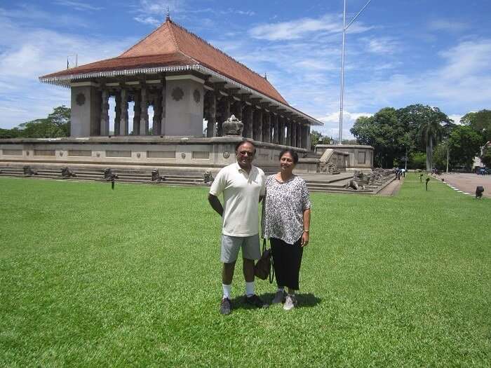 Roshans parents posing in a garden in Colombo