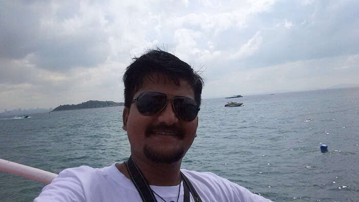 Amit clicking a selfie on the speed boat to Coral Island