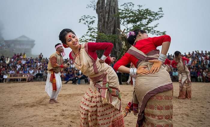 Dancers dancing to celebrate the Bihu festival