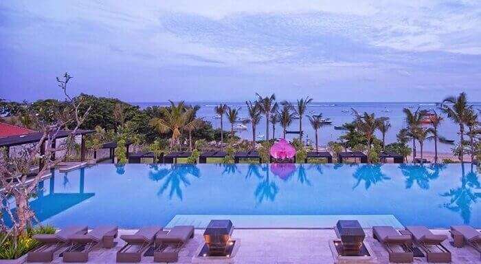 The 50 m long infinity pool adds at the Fairmont beach resort in Bali