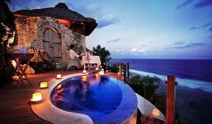 A romantic candlelight dinner overlooking a cliff at the Karma Kandara