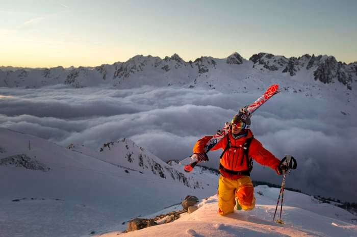 A skier all set to ski in the Alps