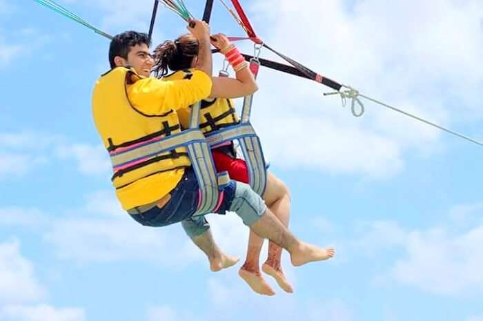 Tarun and his wife parasailing in Ile Aux Cerfs