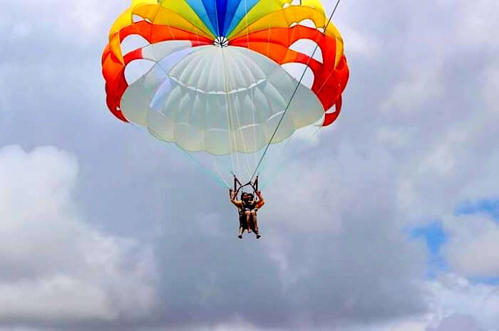 Tarun and his wife on a parachute