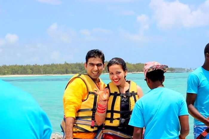 Tarun and his wife on a speedboat in Ile Aux Cerfs
