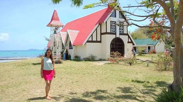 Taruns wife in front of a church in Port Louis