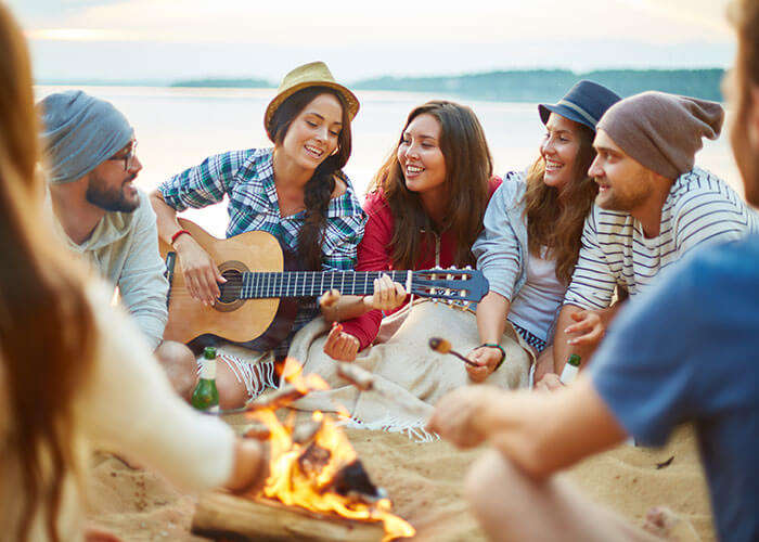 Have a laid back bonfire and barbecue party on New Year in Goa on a budget with your friends on a beach