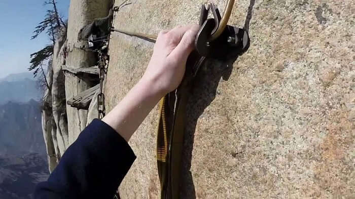 Focus and harness are required to hike Mount Huashan