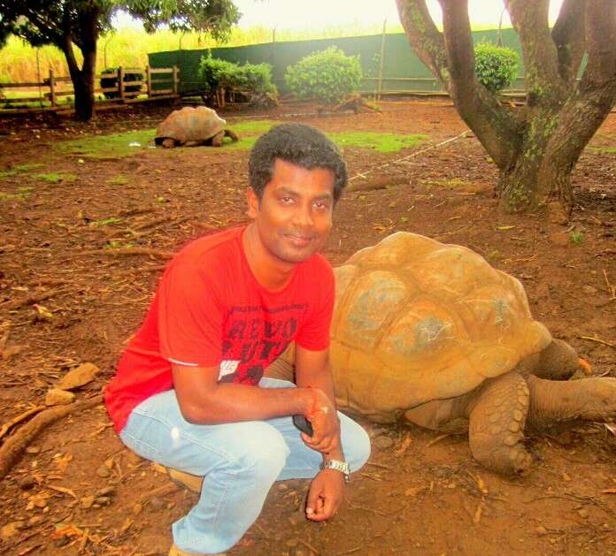 Karthik with a tortoise in Casela Nature Park Mauritius