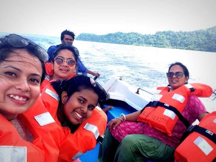 with 5 members on the speed boat to Red Skin Island
