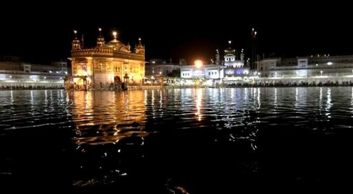 Golden Temple lit with lights at night