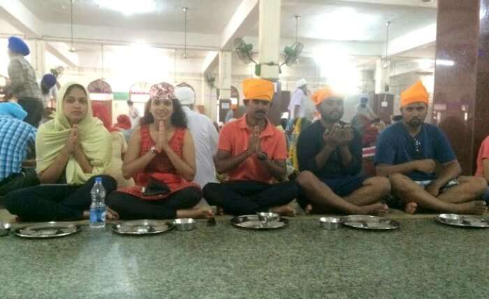 Praying at Golden Temple