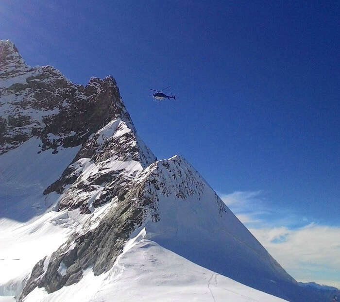 The stunning snow covered Alps covering a clear blue sky