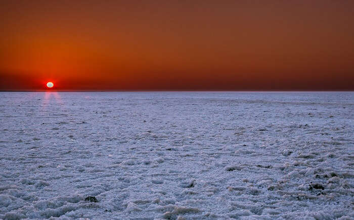 Sunset at the salty marsh lands of Rann of Kutch in Gujarat