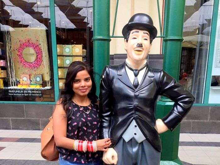 Jyoti with Charlie Chaplin statue in Mauritius