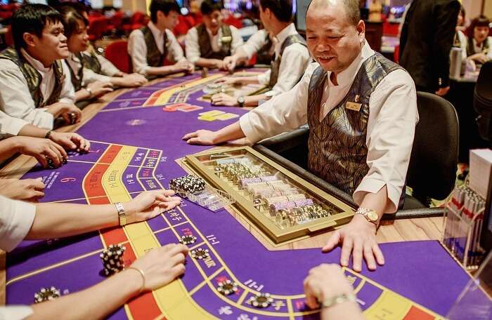 Happy hosts and guests at a casino in Macau