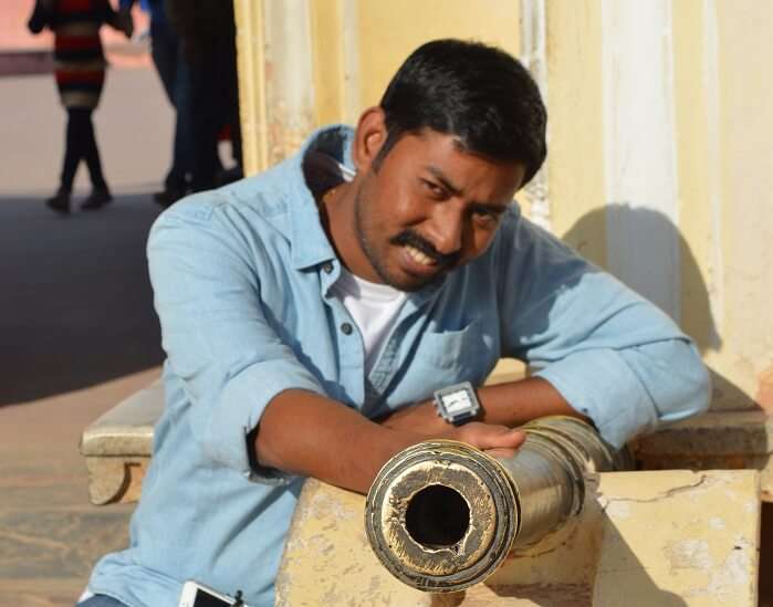 Arvind posing with a small canon in Jaigarh Fort Jaipur