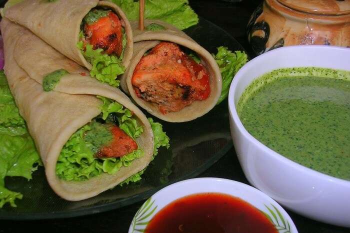 Chicken wraps served with sweet and spicy chutneys