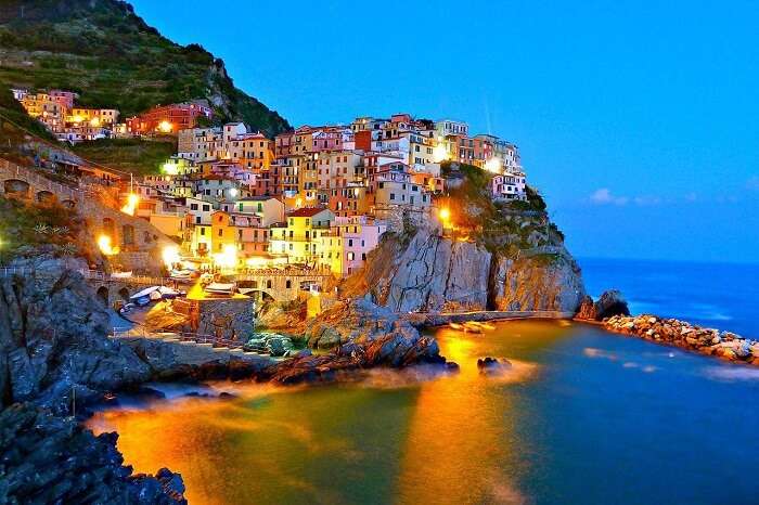 The beautifully lit-up Cinque Terre on an evening