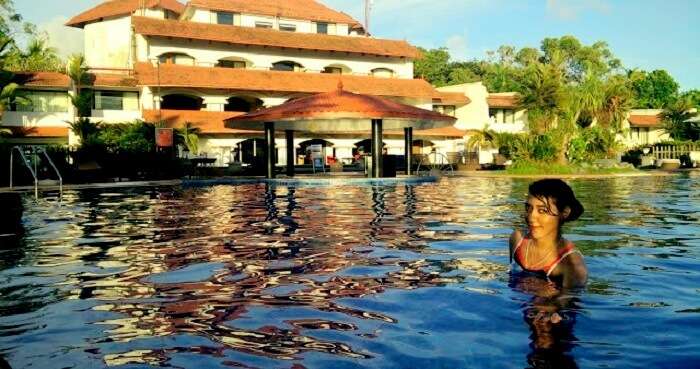 Candida swimming in a resort in Kerala