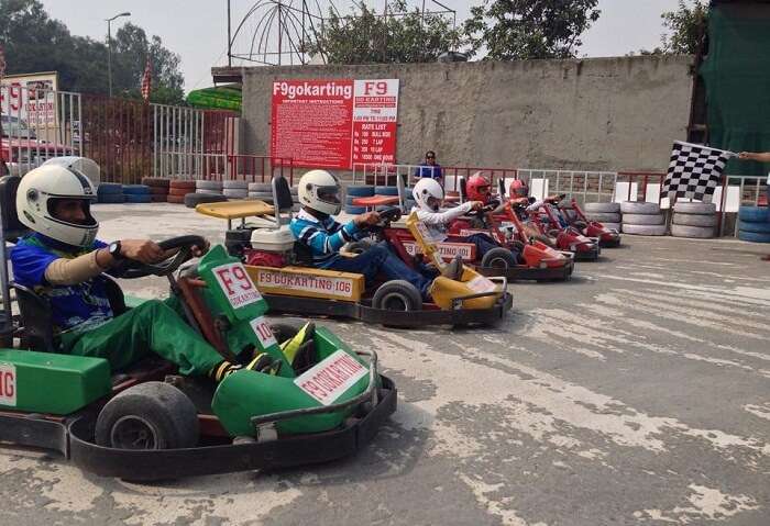 Racers get ready before F-9 Go-kart racing in Gurgaon