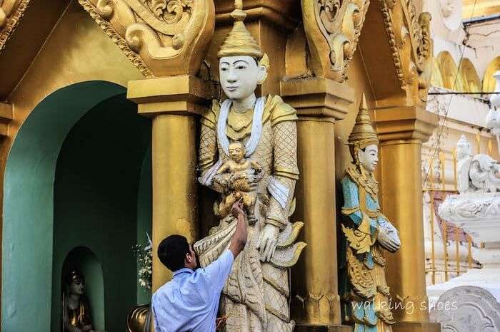 An artist making a sculpture in Myanmar