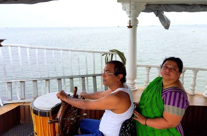 Mohan driving the houseboat