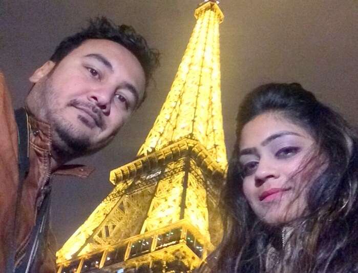 Manvi and her husband in Eiffel Tower 