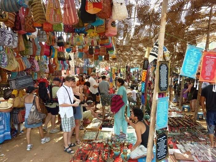 in North Goa vs South Goa, explore the famous Wednesday market of Goa at Anjuna beach 
