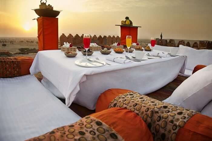 Breakfast on the terrace with a peacock at Citadel in the Thar