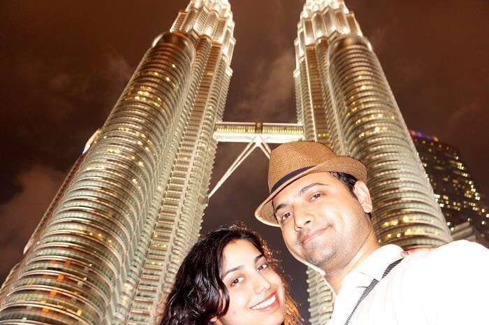 Bhargav and his wife click a selfie near Petronas Towers Malaysia