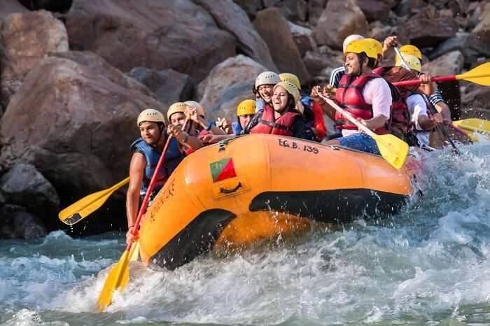 Rafters on one of the rapids during river rafting in Rishikesh