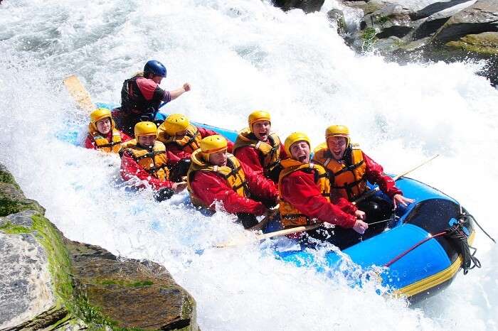 Foreigners trying river rafting in Rishikesh